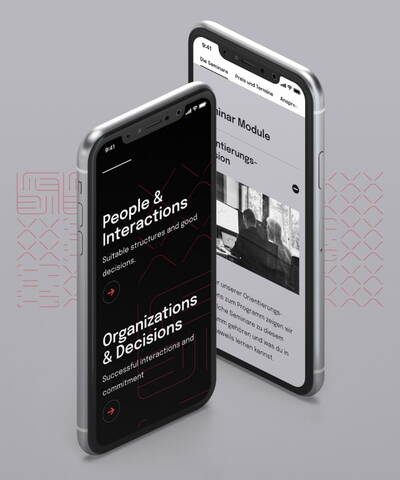 Zwei Smartphones, die die Metaplan Website zeigen.